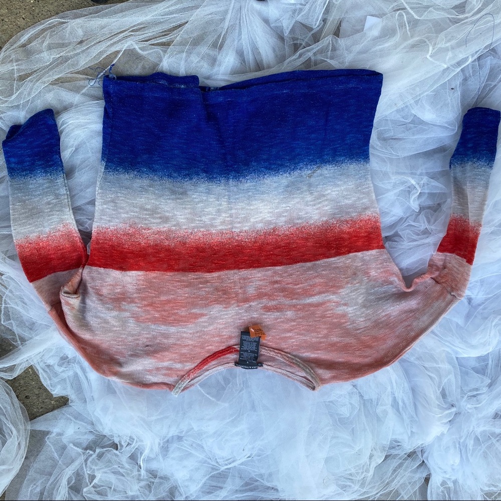 Red white and blue long sleeve blouse.
